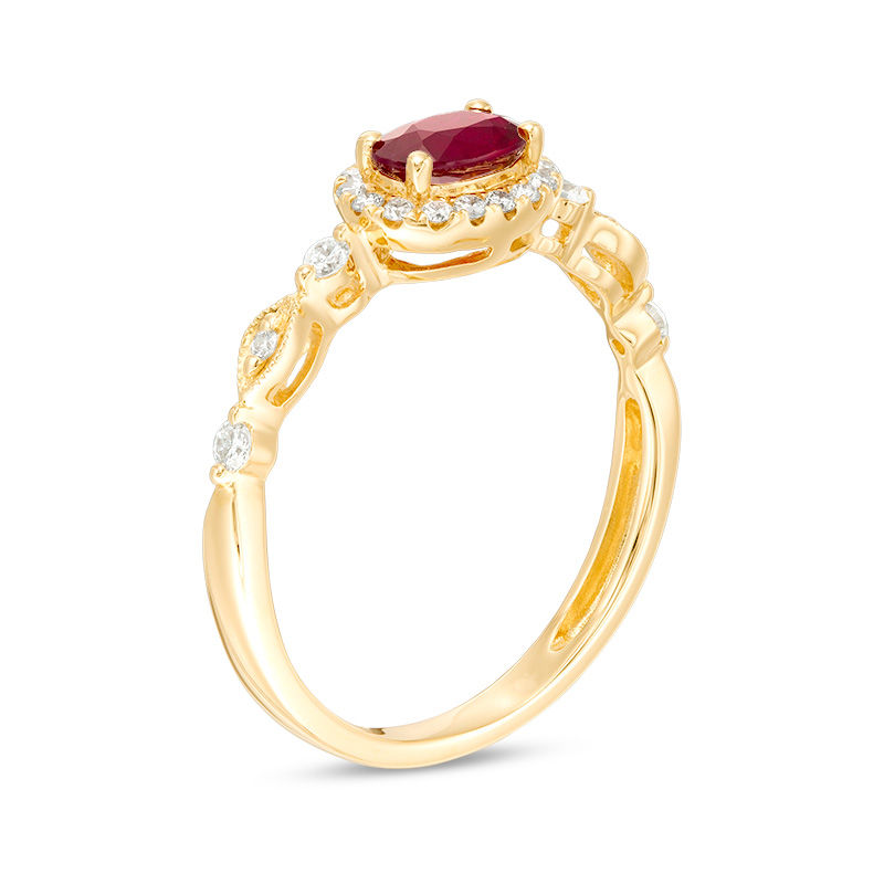 Main Image 2 of Oval Ruby and 1/6 CT. T.W. Diamond Frame Vintage-Style Ring in 10K Gold