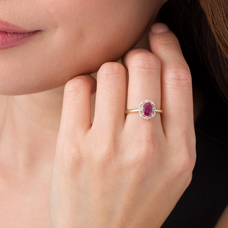 Main Image 3 of Oval Ruby and 1/10 CT. T.W. Diamond Frame Vintage-Style Ring in 10K Gold