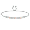 Thumbnail Image 1 of 1/20 CT. T.W. Diamond Fashion "X" Bolo Bracelet in Sterling Silver and 10K Rose Gold - 9.5"
