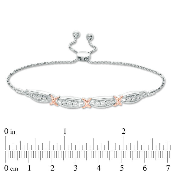 1/20 CT. T.w. Diamond Fashion "X" Bolo Bracelet in Sterling Silver and 10K Rose Gold - 9.5"