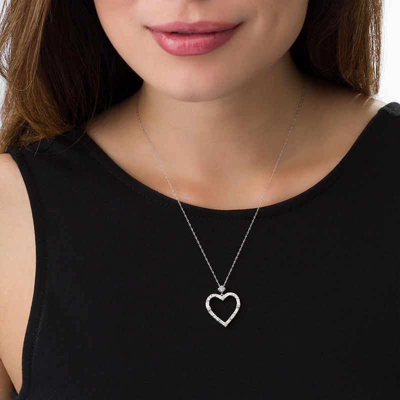 1/2 CT. T.W. Baguette and Round Diamond Alternating Heart Outline Pendant in 10K White Gold