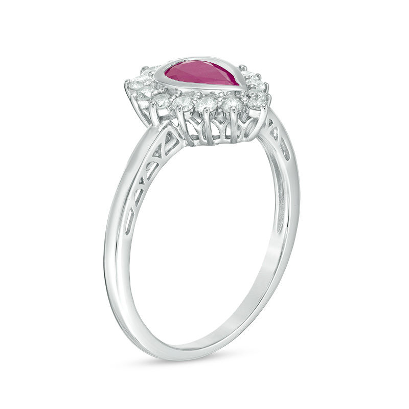 Pear-Shaped Ruby and 1/4 CT. T.W. Diamond Starburst Frame Ring in 10K White Gold