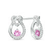 Thumbnail Image 0 of 3.0mm Lab-Created Pink Sapphire and 1/6 CT. T.W. Diamond Heart Knot Teardrop Earrings in 10K White Gold