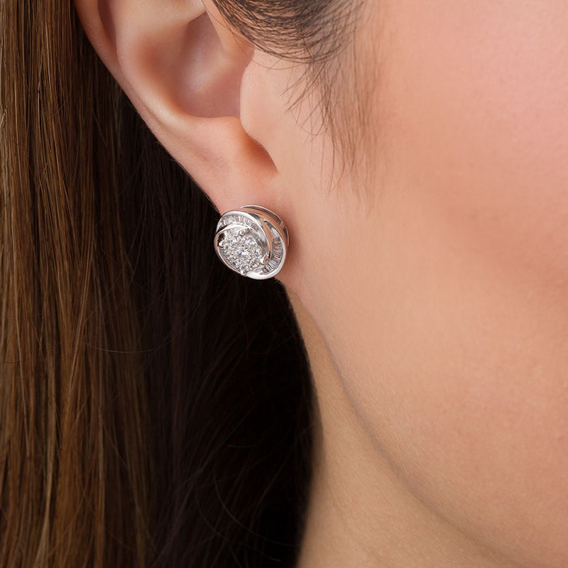 Main Image 2 of 3/4 CT. T.W. Baguette and Round Diamond Swirl Love Knot Stud Earrings in Sterling Silver