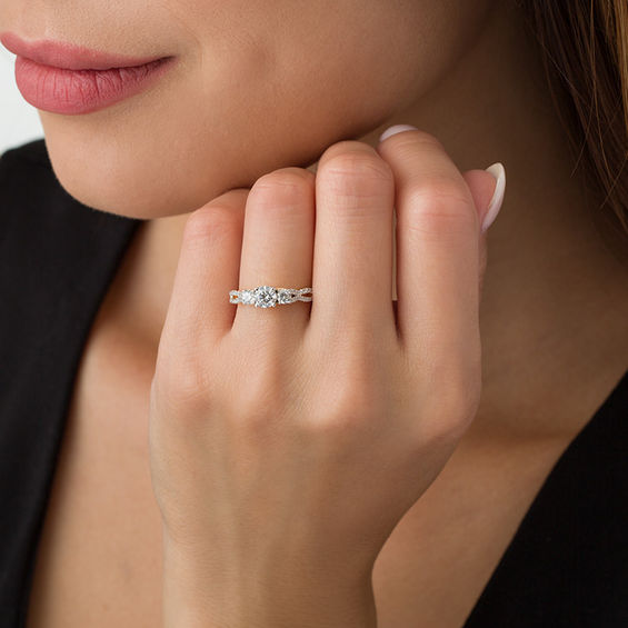 1 CT. T.w. Diamond Three Stone Braid Engagement Ring in 10K Gold