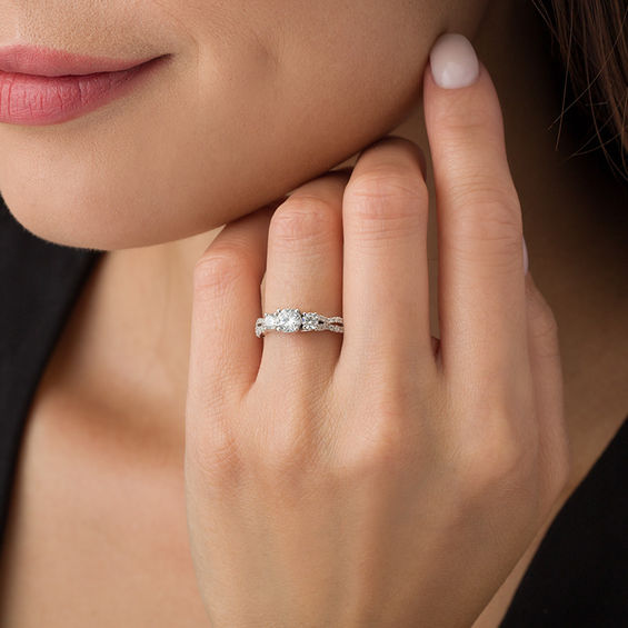 1 CT. T.w. Diamond Three Stone Braid Engagement Rink in 10K White Gold