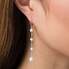 Thumbnail Image 2 of 4.0-8.0mm Oval Freshwater Cultured Pearl Silver Thread Station Drop Earrings with Sterling Silver Backs