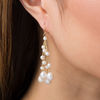 Thumbnail Image 2 of 4.0-8.0mm Oval Freshwater Cultured Pearl Gold Thread Tassel Drop Earrings with 14K Gold Backs