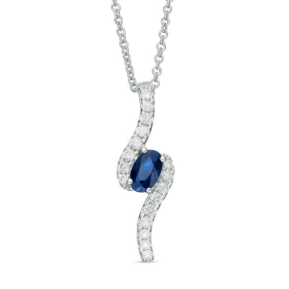Oval Blue Sapphire and 1/6 CT. T.w. Diamond Bypass Pendant in 10K White Gold