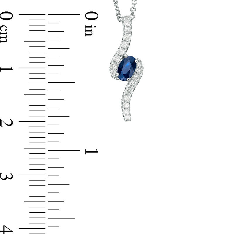 Main Image 2 of Oval Blue Sapphire and 1/6 CT. T.W. Diamond Bypass Pendant in 10K White Gold