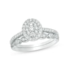 Thumbnail Image 1 of 1/2 CT. T.W. Composite Oval Diamond Double Frame Bridal Set in 10K White Gold