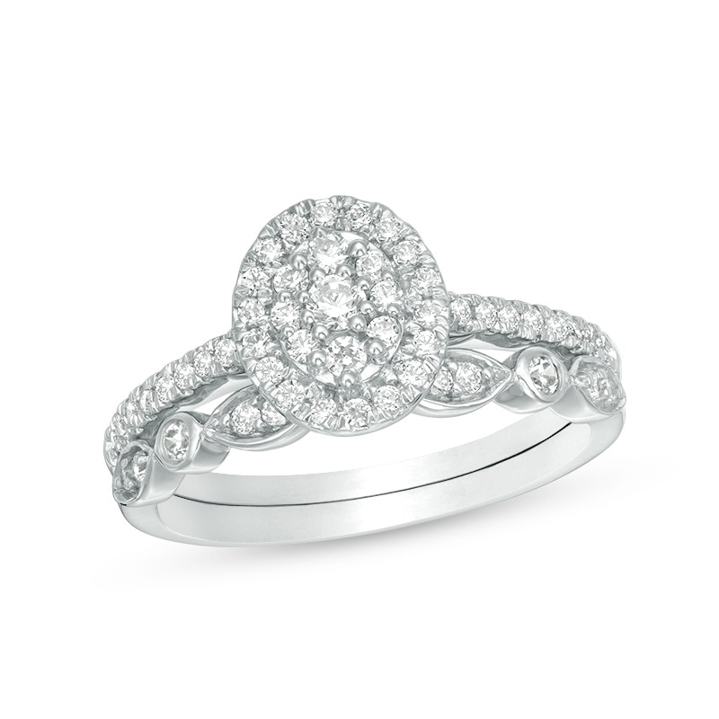 Main Image 1 of 1/2 CT. T.W. Composite Oval Diamond Double Frame Bridal Set in 10K White Gold