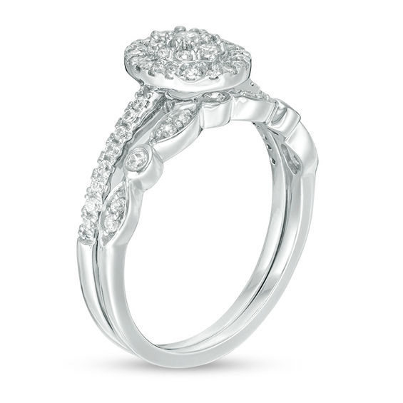 1/2 CT. T.w. Composite Oval Diamond Double Frame Bridal Set in 10K White Gold