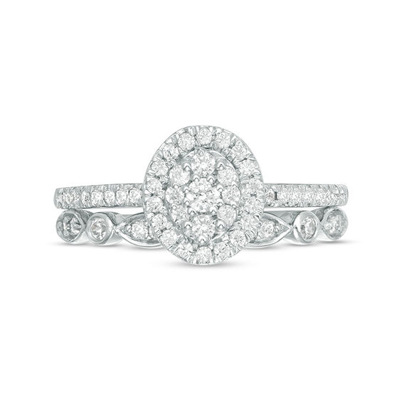1/2 CT. T.w. Composite Oval Diamond Double Frame Bridal Set in 10K White Gold