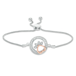 1/15 CT. T.W. Diamond Open Circle Paw Print Bolo Bracelet in Sterling Silver and 10K Rose Gold - 9.5"