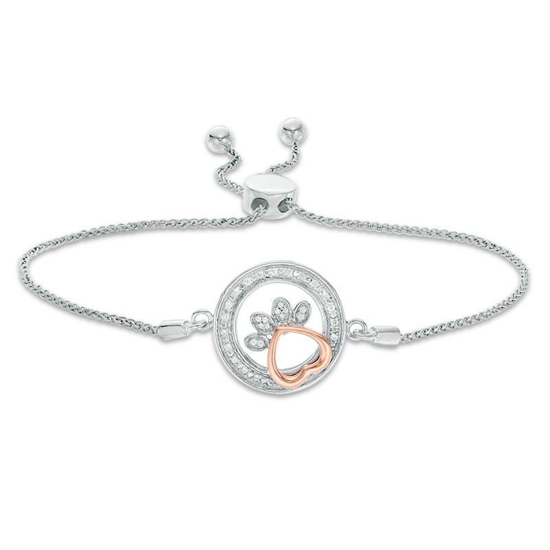 Main Image 1 of 1/15 CT. T.W. Diamond Open Circle Paw Print Bolo Bracelet in Sterling Silver and 10K Rose Gold - 9.5"