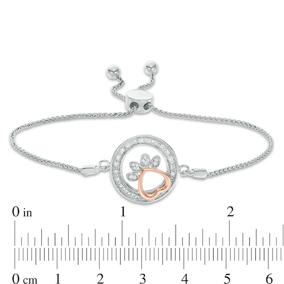 1/15 CT. T.w. Diamond Open Circle Paw Print Bolo Bracelet in Sterling Silver and 10K Rose Gold - 9.5"