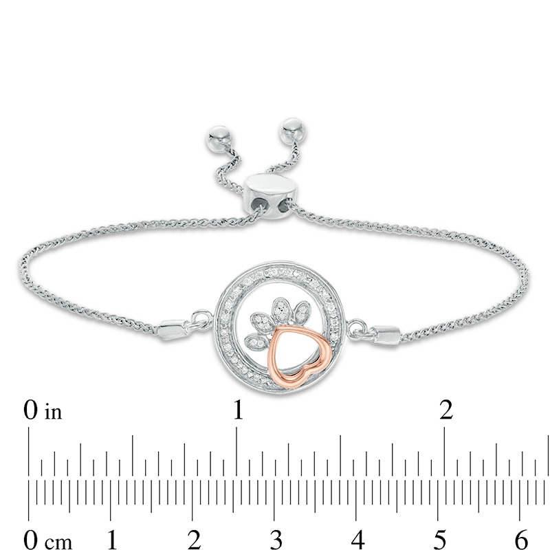 Main Image 2 of 1/15 CT. T.W. Diamond Open Circle Paw Print Bolo Bracelet in Sterling Silver and 10K Rose Gold - 9.5"
