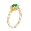 Thumbnail Image 2 of Oval Emerald and 1/5 CT. T.W. Diamond Starburst Frame Ring in 10K Gold