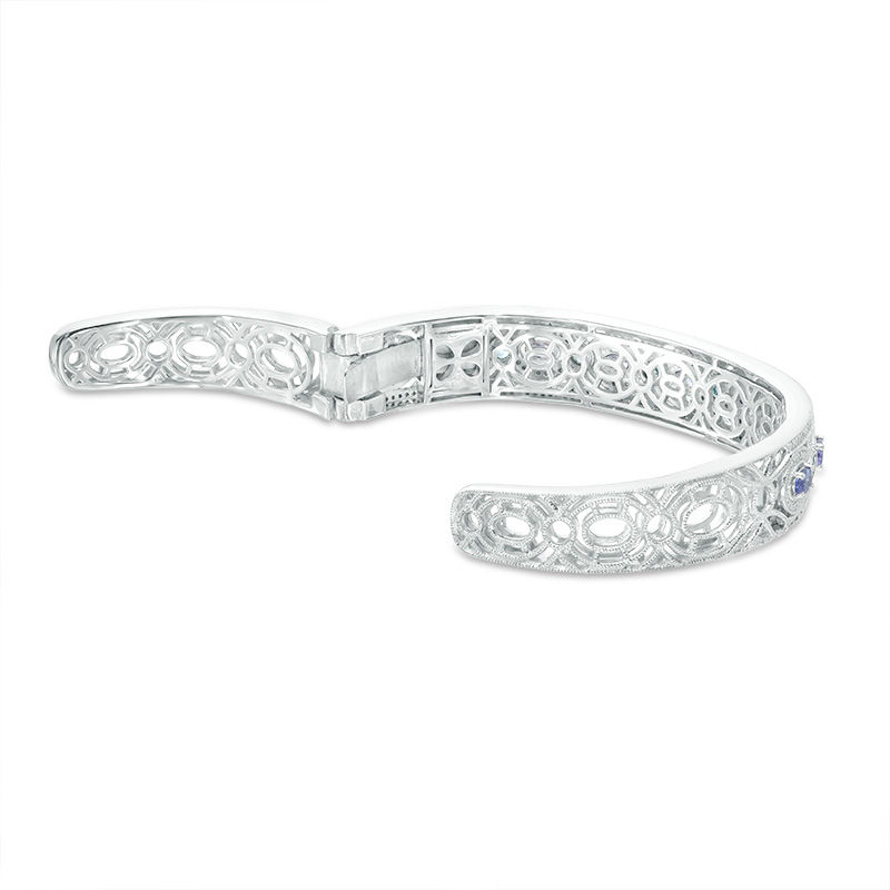 Main Image 2 of Oval Tanzanite, Swiss Blue Topaz and 1/8 CT. T.W. Diamond Vintage-Style Cuff in Sterling Silver