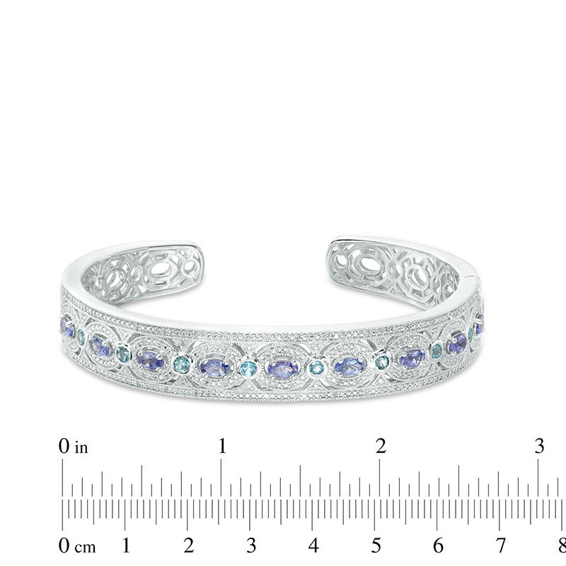 Oval Tanzanite, Swiss Blue Topaz and 1/8 CT. T.W. Diamond Vintage-Style Cuff in Sterling Silver