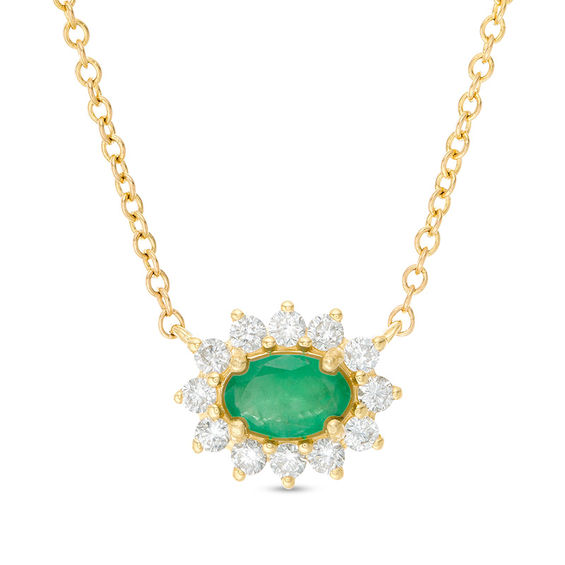 Sideways Oval Emerald and 1/5 CT. T.w. Diamond Starburst Frame Necklace in 10K Gold