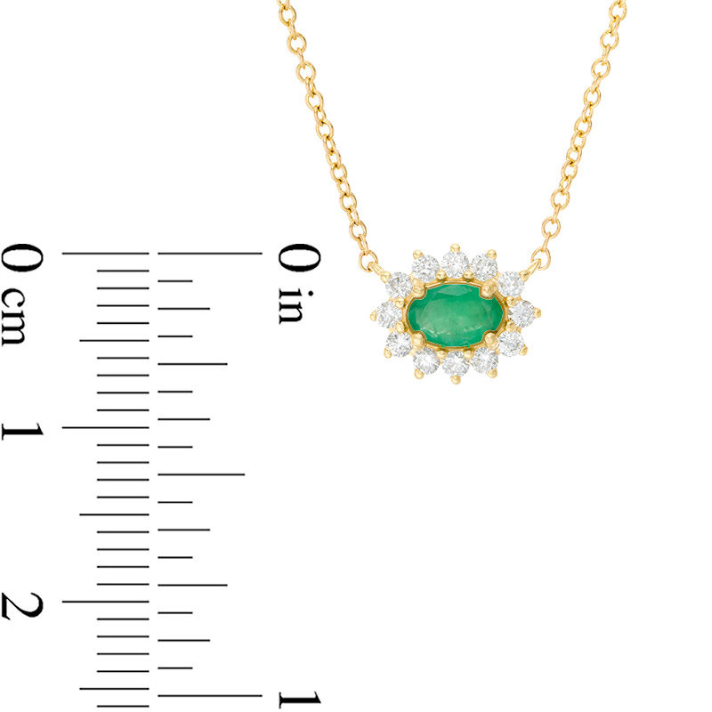 Main Image 2 of Sideways Oval Emerald and 1/5 CT. T.W. Diamond Starburst Frame Necklace in 10K Gold
