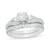 Thumbnail Image 1 of 1-3/8 CT. T.W. Diamond Bypass Three Stone Bridal Set in 14K White Gold