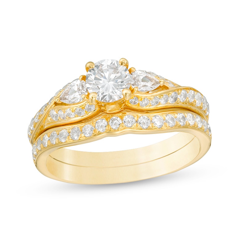 Main Image 1 of 1-3/8 CT. T.W. Diamond Bypass Ribbon Three Stone Bridal Set in 14K Gold