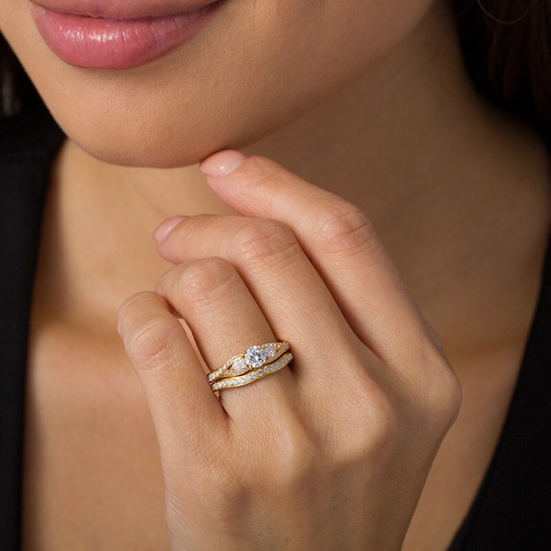 Main Image 2 of 1-3/8 CT. T.W. Diamond Bypass Ribbon Three Stone Bridal Set in 14K Gold