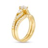 Thumbnail Image 3 of 1-3/8 CT. T.W. Diamond Bypass Ribbon Three Stone Bridal Set in 14K Gold