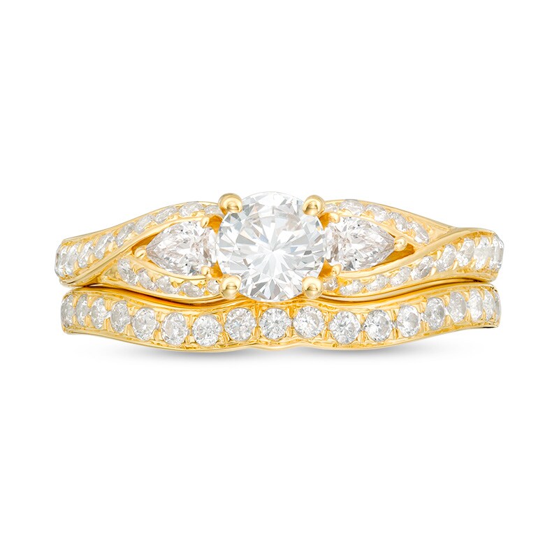 Main Image 4 of 1-3/8 CT. T.W. Diamond Bypass Ribbon Three Stone Bridal Set in 14K Gold