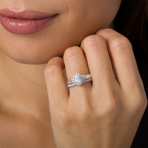 1 CT. T.w. Oval Diamond Frame Collar Bridal Set in 14K White Gold