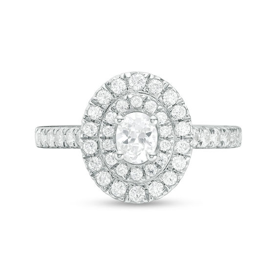 1 CT. T.w. Oval and Round Diamond Double Frame Engagement Ring in 14K White Gold