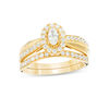 Thumbnail Image 0 of 3/4 CT. T.W. Oval Diamond Frame Crossover Bridal Set in 14K Gold