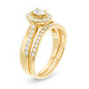 Thumbnail Image 2 of 3/4 CT. T.W. Oval Diamond Frame Crossover Bridal Set in 14K Gold
