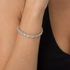 Thumbnail Image 1 of 1/2 CT. T.W. Multi-Diamond "XO" Bracelet in Sterling Silver - 7.25"