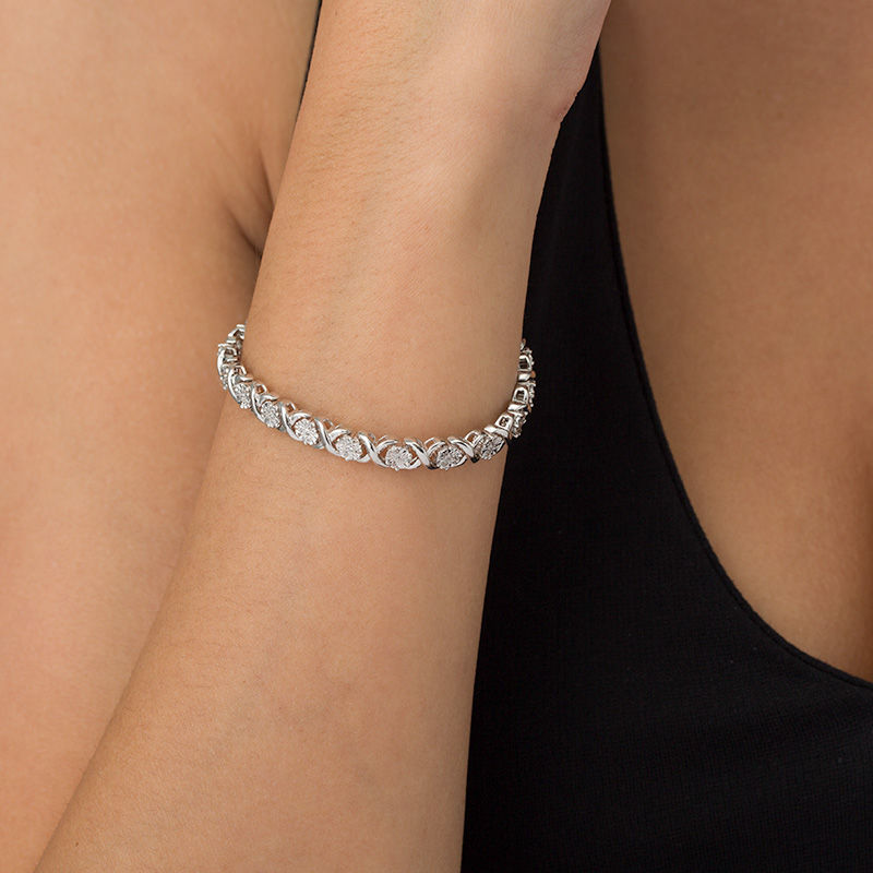 1/2 CT. T.W. Multi-Diamond "XO" Bracelet in Sterling Silver - 7.25"