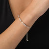 Thumbnail Image 2 of 1/20 CT. T.W. Diamond Three Stone and Bar Station Bolo Bracelet in Sterling Silver and 10K Rose Gold - 9.5"