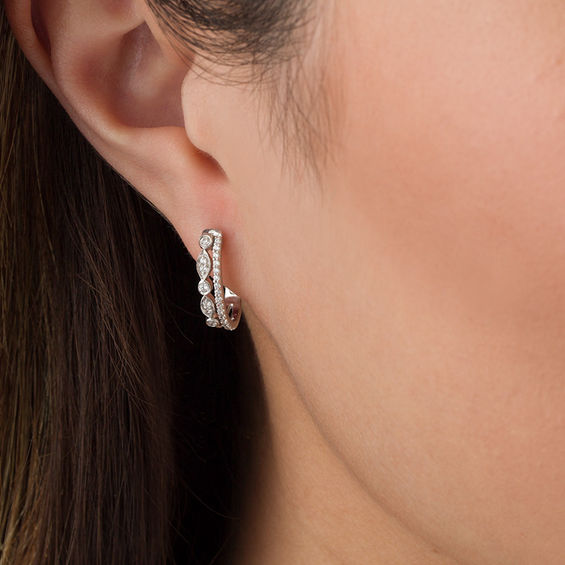 1/4 CT. T.w. Diamond Double Hoop Earrings in 10K White Gold