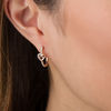 Thumbnail Image 1 of 1/8 CT. T.W. Diamond Heart Knot Hoop Earrings in 10K Rose Gold