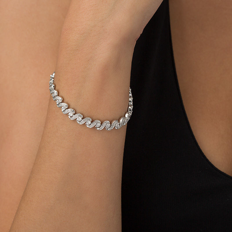 Main Image 2 of 1/2 CT. T.W. Diamond "S" Bracelet in Sterling Silver - 7.25"