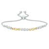 Thumbnail Image 1 of 1/20 CT. T.W. Diamond Alternating Twist Bolo Bracelet in Sterling Silver and 10K Gold - 9.5"