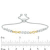 Thumbnail Image 3 of 1/20 CT. T.W. Diamond Alternating Twist Bolo Bracelet in Sterling Silver and 10K Gold - 9.5"