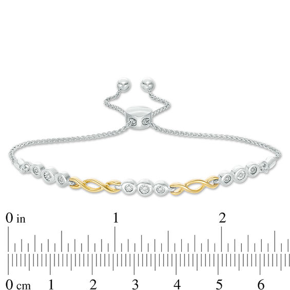 1/20 CT. T.w. Diamond Alternating Twist Bolo Bracelet in Sterling Silver and 10K Gold - 9.5"