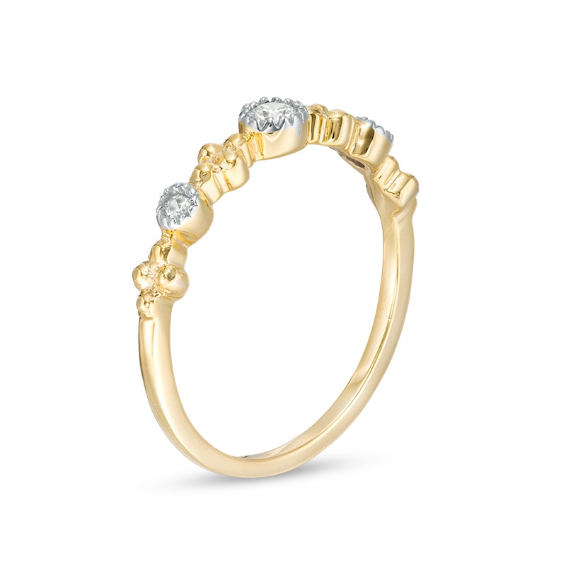 Main Image 2 of 1/15 CT. T.W. Diamond Three Stone Beaded Band in 10K Gold