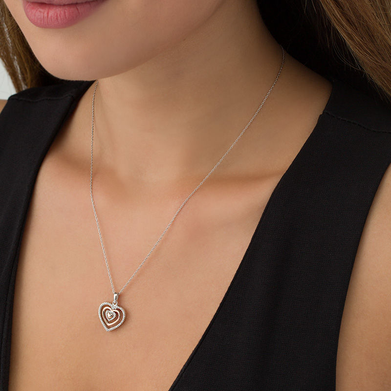 Main Image 2 of 1/6 CT. T.W. Diamond Heart Pendant in Sterling Silver and 10K Rose Gold