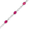 Thumbnail Image 0 of Oval Lab-Created Ruby Infinity Link Bracelet in Sterling Silver - 7.5"