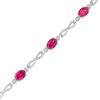 Thumbnail Image 1 of Oval Lab-Created Ruby Infinity Link Bracelet in Sterling Silver - 7.5"