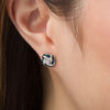 Thumbnail Image 2 of Enhanced Blue and White Diamond Accent Knot Stud Earrings in Sterling Silver